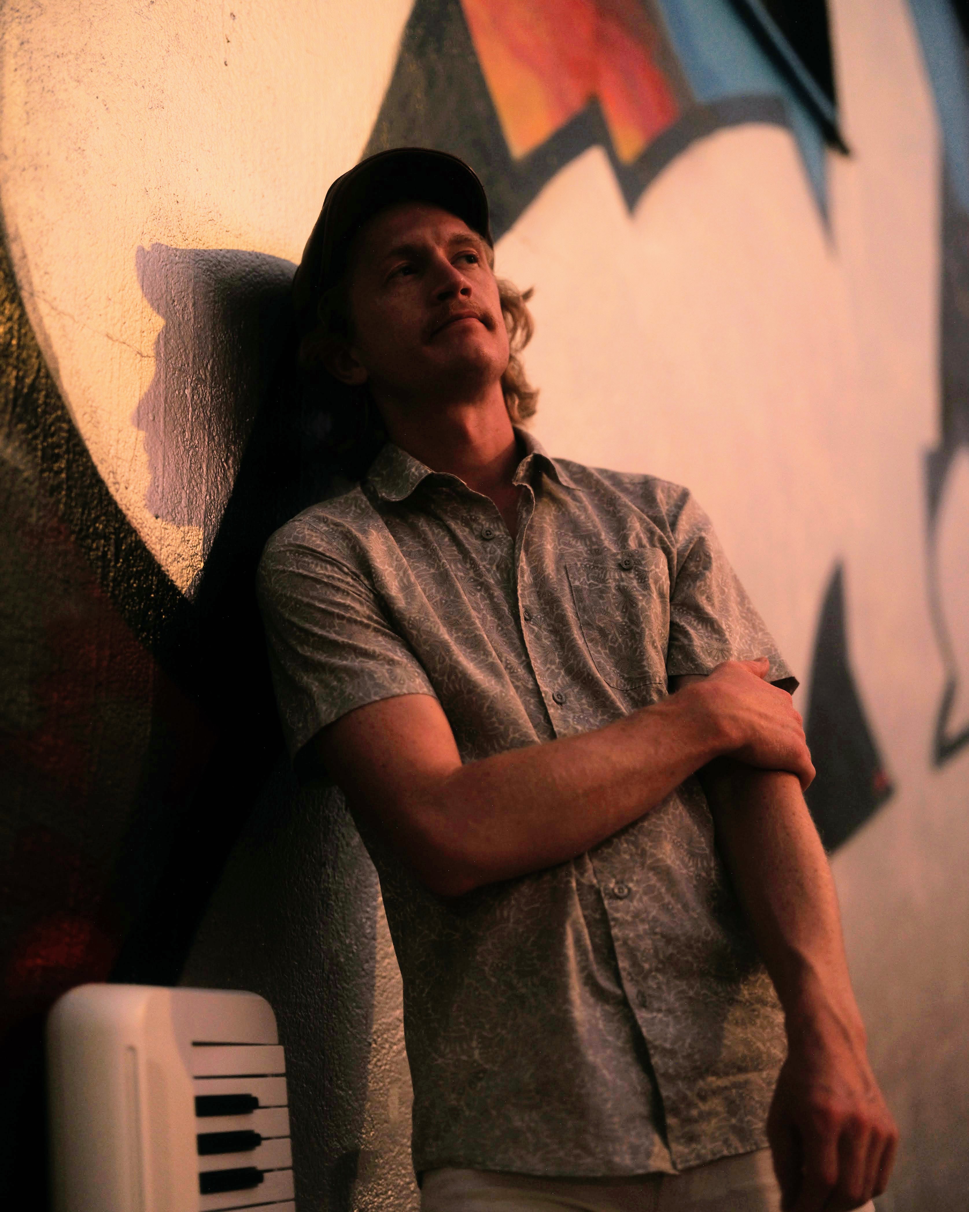 Nim Zimmer seated at a piano